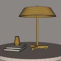 Contemporary Metal Table Lamp Illuminated On White Round Table With Books And Golden Decor
