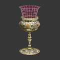 Decorative Furniture Accent with Red Glass Shade and Silver Ornate Base Featuring Detailed Decorative Patterns