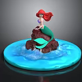 Little Mermaid Figurine Sitting On Rock With Red Hair Green Tail And Blue Water Waves