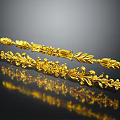 Golden Decorative Carved Designs With Floral And Leaf Motifs On Shiny Surface
