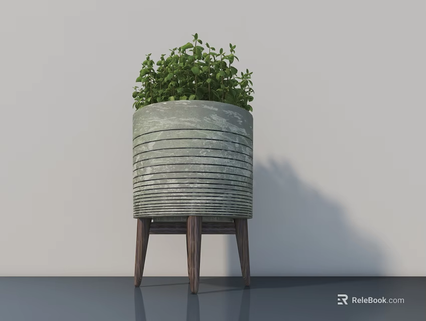 Green Leaf Potted Plant In Gray Striped Pot With Wooden Stand On Dark Floor 3d model 