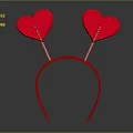 Red Decorative Headband With Two Sparkly Heart Shaped Ornaments on Gray Background