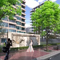 Modern High Rise Building Exterior With Glass Windows Green Trees And Decorative Wall