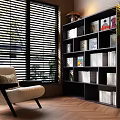 Black Bookcase With Books And Decorative Paintings By Window With Armchair And Plant