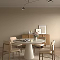 Cozy Restaurant Dining Area With Round White Table Beige Chairs Wooden Cabinet And Wall Art