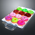 Colorful Donuts With Various Icing Colors And Sprinkles On Transparent Tray
