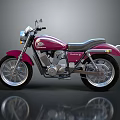 Maroon Classic Motorcycle With Black Seat And Shiny Silver Wheels Design
