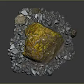 Large Natural Rock With Yellow Spots Surrounded By Small Stones And Pebbles