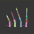 Silver Dental Handpieces In Various Sizes With Connected Wires On Dark Background