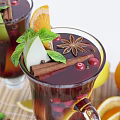 Homemade Red Beverage In Glasses With Orange Lemon Slices Cranberries Cinnamon Sticks And Mint Leaves