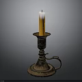 Vintage Candlestick Holder With Lit Yellow Candle And Ornate Design