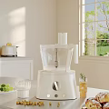 Bright Modern Kitchen Countertop With White Food Processor Toaster Fresh Limes And Glassware