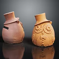 Pair of Ceramic Owl Figurines Wearing Top Hats With Decorative Earthenware Details