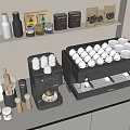 Two Black Coffee Machines With White Cups Coffee Bean Packages And Utensils On Kitchen Counter