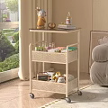 White Multi Tiered Rolling Mesh Shelf with Decorations Books and Storage Boxes in Living Room