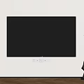 Large Screen Wall Mounted Television On White Wall With Sculpture And Wooden Floor
