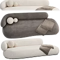 Cozy Sectional Sofa In Beige White Gray With Round Pillows And Throw Blanket