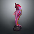 Vibrant Colored Dolphin Sculpture Standing In Upright Pose On Black Stone Base