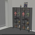 Modern Action Figure Display Cabinet With Glass Doors And Collectibles In Room With Blinds