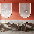 Modern Dining Table Set With Metal Frame Chairs And Pendant Lights On Coral Wall