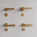 Golden Modern Door Handles With Lock Cylinders On Light Gray Background