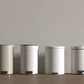 Modern Pedal Trash Bins in Beige and White Colors for Home Use on Wooden Floor