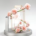 Elegant Floral Display with Purple Flowers in Glass Container on Modern Pedestal
