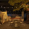 Cozy Camping Style Restaurant With Tents Trees String Lights And Pebble Floor