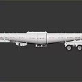 Silver Tanker Truck With Multiple Cylindrical Tanks And Reflective Surface On Black Background