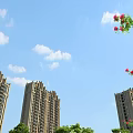 Pergola Surrounded by Tall Buildings Red Flowers and Green Shrubs Under Blue Sky