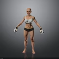 Bald Woman in White Sports Bra Black Shorts with White Boxing Gloves Standing Pose