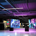 Modern Parking Garage With Colorful LED Lighting Sleek Ceiling And Reflective Floor