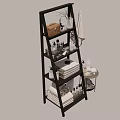 Laundry and Daily Essentials Organized on Black Multi Tier Ladder Shelf with Towels Toiletries and Storage Baskets