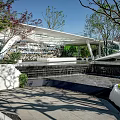 Modern Garden Landscape Design With Curved Canopy Water Feature And Stone Paving