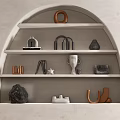 Modern Decorative Ornament Combination On Arched Shelf With Sculptures Vases And Geometric Pieces
