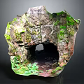 Garden Ornament Featuring Rocky Structure Covered in Moss with Small Cave Opening and Green Plants