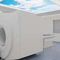 Modern CT Scanner in Medical Room with Blue Floor Skylight Mobile Cart and Display Screen