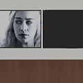 Two Wall Mounted TVs With Wooden Cabinet Showing Content And Black Screen