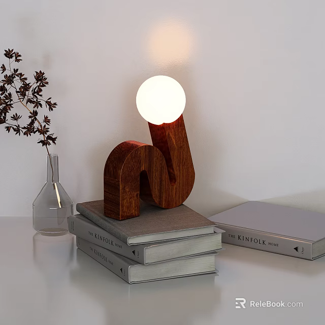 Modern n shaped Wooden Table Lamp with Spherical Bulb on Stack of Books and Glass Vase 3d model 