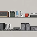 Modern Headphones and Speakers With Various Styles and Colors on Shelf