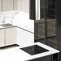 Modern Kitchen With Black And White Cabinets Marble Countertop And Built in Lighting