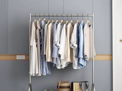 Sturdy Metal Clothes Rack Hanging Various Neutral Light Blue Clothes with Woven Baskets Below 3d model