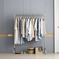Sturdy Metal Clothes Rack Hanging Various Neutral Light Blue Clothes with Woven Baskets Below 3d model