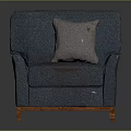 Vintage Distressed Blue Armchair With Gray Pillow And Solid Wooden Legs