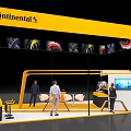 Continental Exhibition Booth With Yellow Canopy Tire Patterns People Tables Chairs And TV Screen
