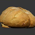 Fresh Baked Bread Two Sliced Pieces Golden Crust Soft Porous Interior on Black Surface