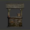 Ancient Well Structure Featuring Brick Stone Base Thatched Roof And Wooden Bucket