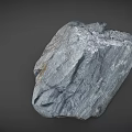 Natural Gray Stone With Textured Surface And Yellow Specks As Raw Decorative Material
