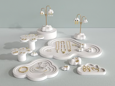 Elegant Gold Jewelry Display On Cloud Shaped Stands With Necklaces Earrings And Rings 3d model