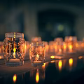 Glass Jar Candle Lamps Lighting Combination With Warm Ambient Light Arranged On Tabletop